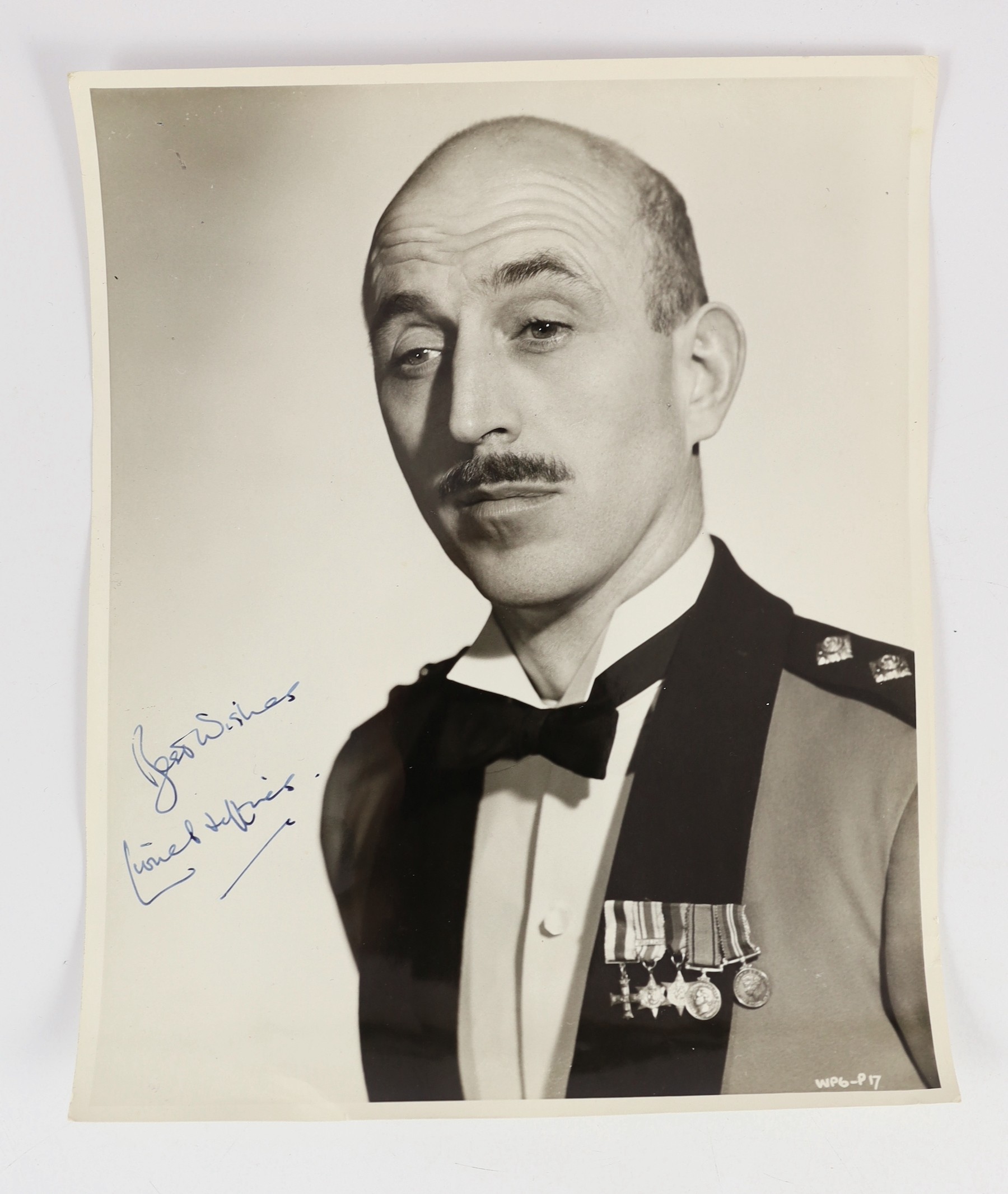 Lionel Jeffries (1926-2010) - Three signed black and white photographs of the actor/ director and 52 various other images showing him on set and between rehearsals, covering a large number of films, with theatre and othe